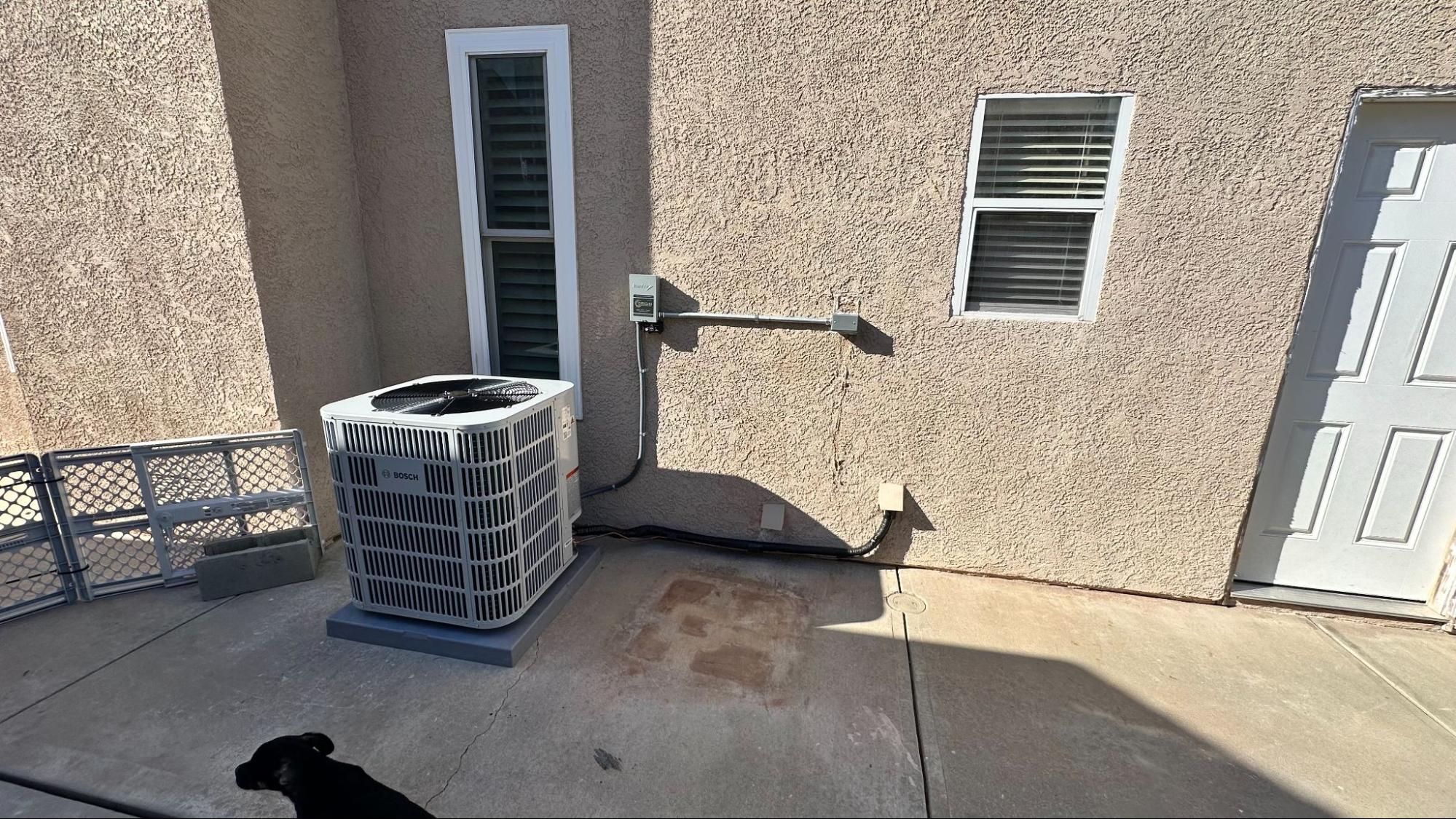 Outdoor HVAC condenser unit installed beside a Tehachapi home, ready to handle seasonal heating and cooling demands